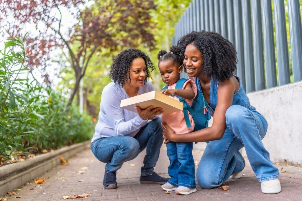 African family having fun at the end of a school day